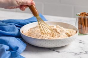 mixing together dry ingredients with a whisk