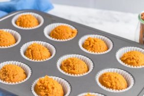 pumpkin muffin batter in a muffin pan