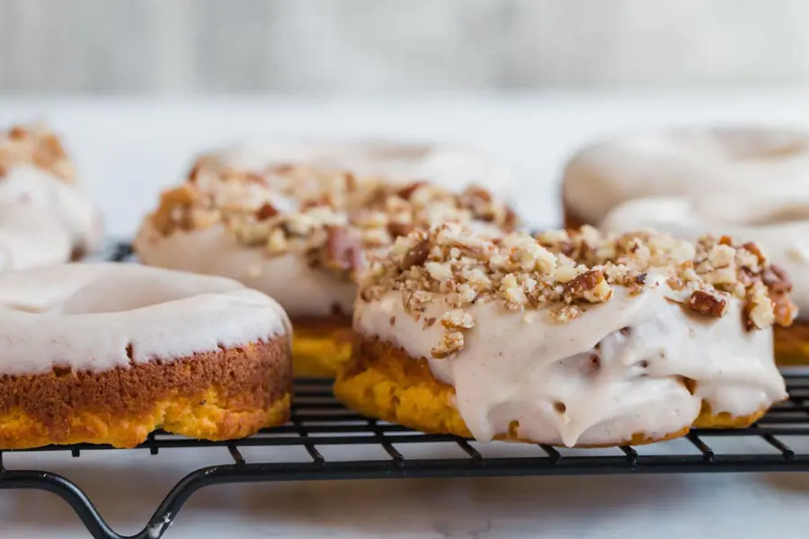 glazed keto pumpkin donut on a wire rack