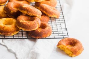 pumpkin donuts on a wire rack