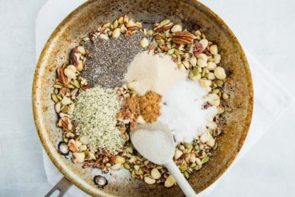 spices sitting on top of roasted nuts