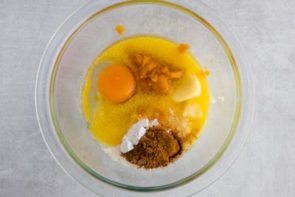 egg and pumpkin and other ingredients in a small bowl
