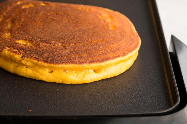 pancake cooking ona griddle