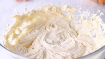 Cream cheese frosting in a mixing bowl.