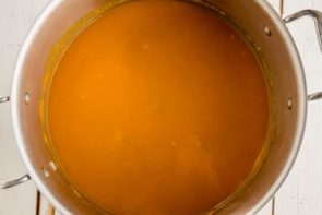 orangish liquid in a pot