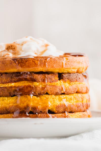 stack of five pumpkin waffles on aplate