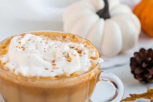 pumpkin spice latte with whipped cream on top