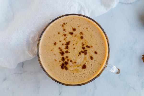 bullet proof coffee sitting on a counter with spices in it