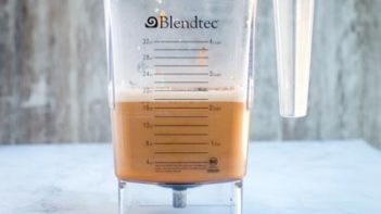 keto pumpkin spice latte ingredients sitting in a blender