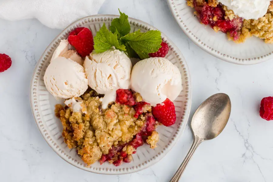 overhead view of juicy raspberry crumble