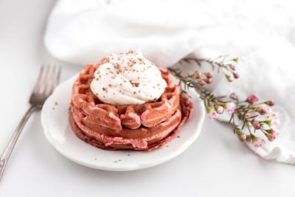 sugar free red velvet waffles on a plate with some flowers