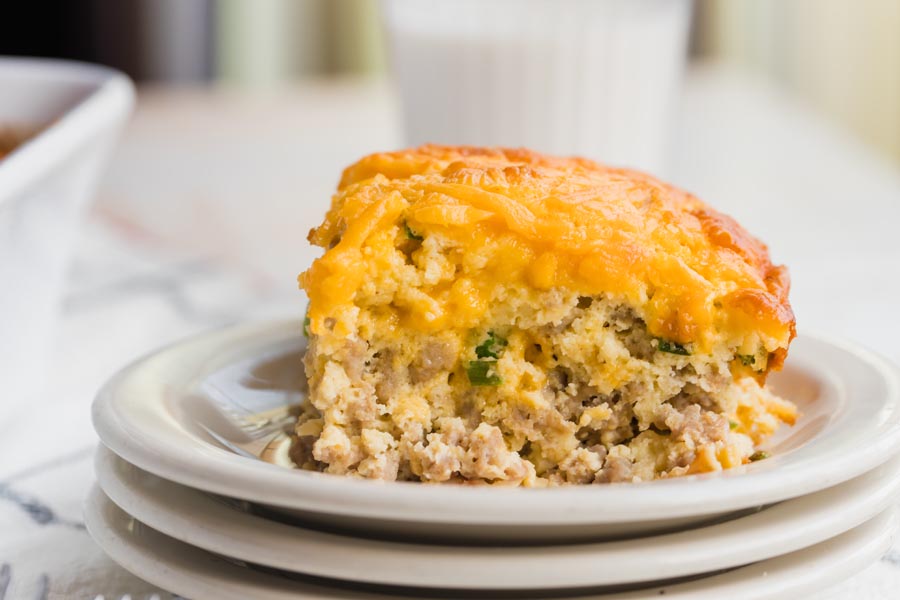 a close up of a thick cheesy sausage low carb casserole