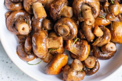 a bowl of buttery garlic keto mushrooms