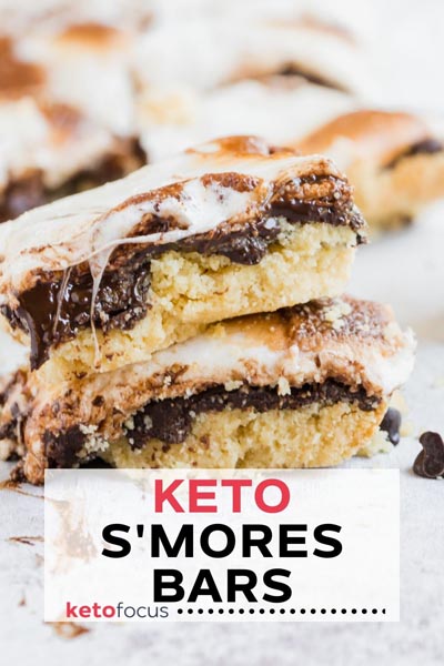 smores bars stack on top of each other with melted chocolate coming down