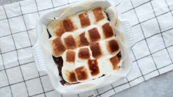 toasted marshmallows in a white baking dish