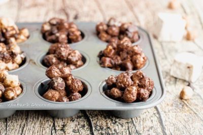 a muffin tin filled with chocolate gooey balls