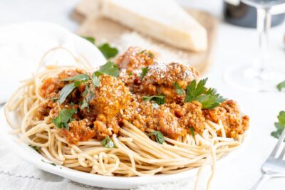 a plate of keto spaghetti topped with parsley