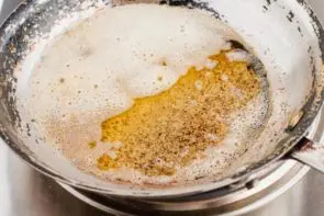 spice mixture and butter heated in a skillet