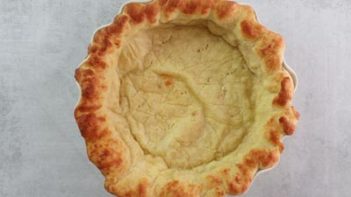 pie pan on top of fathead dough