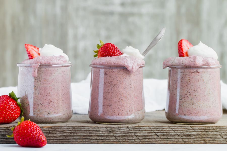 three jars of chia pudding lined up