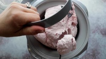 strawberry ice cream in an ice cream maker