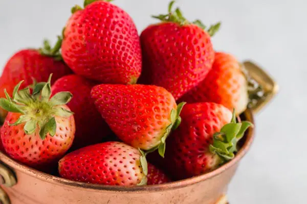 ripe strawberries in a collander