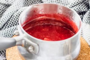 strawberry syrup in a saucepan