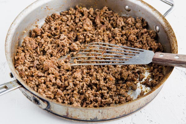 low carb taco meat in a skillet with a spatula