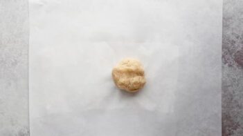 chip dough on a sheet of parchment paper