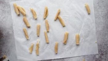 roll chips on a sheet of parchment