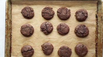 flatten out chocolate cookies with the back of a spoon