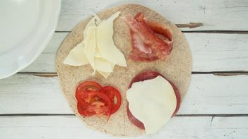 salami, cheese, bacon and tomato in each quadrant of the viral hack