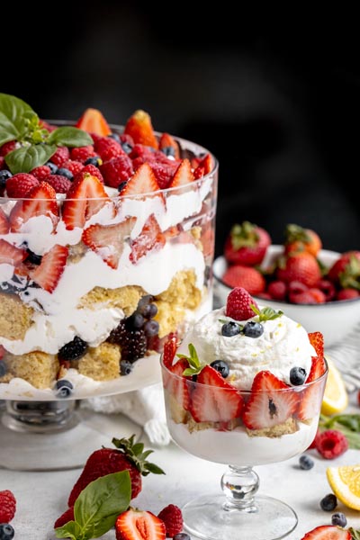 brightly color red, white and blue trifle in front of a black background