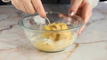 mixing batter in a small bowl