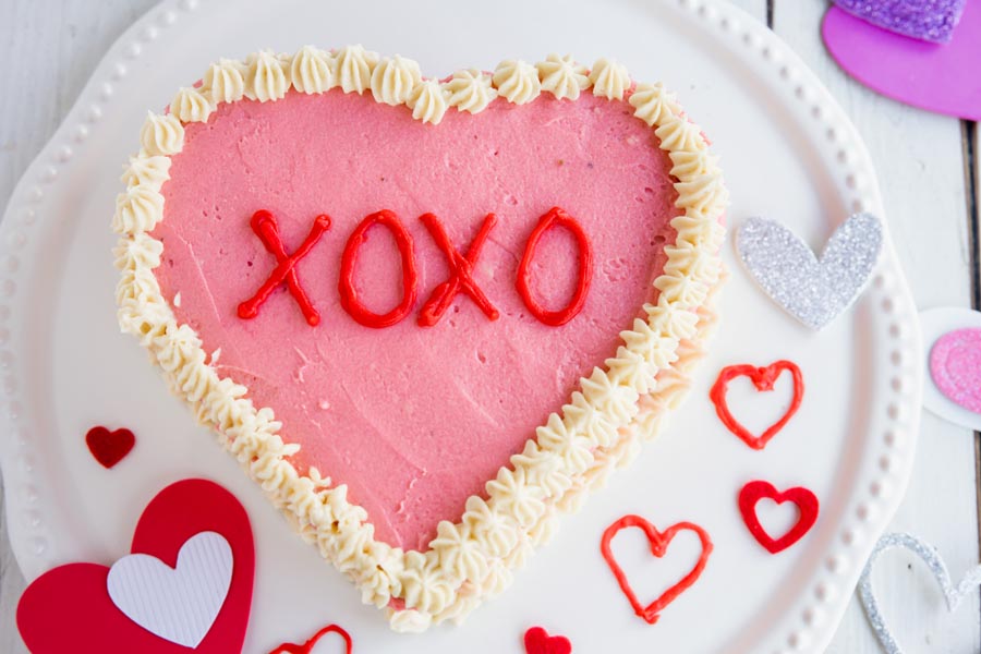 valentines day cake with hearts surrounding it