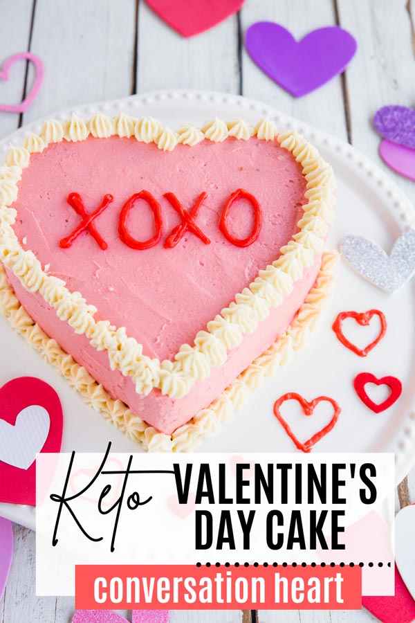 conversation heart cake with xoxo on it