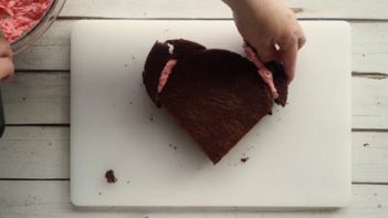 making a heart shaped cake from a round cake