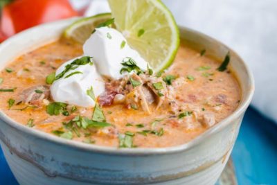 creamy low carb white chili with no beans topped with sour cream