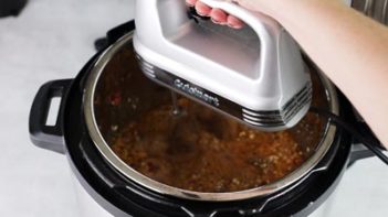 shredding chicken with an electric mixer