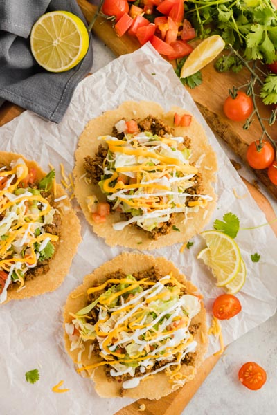crispy tostadas with cilantro, tomatoes and limes