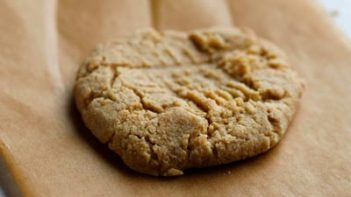 a baked peanut butter cookie on parchment