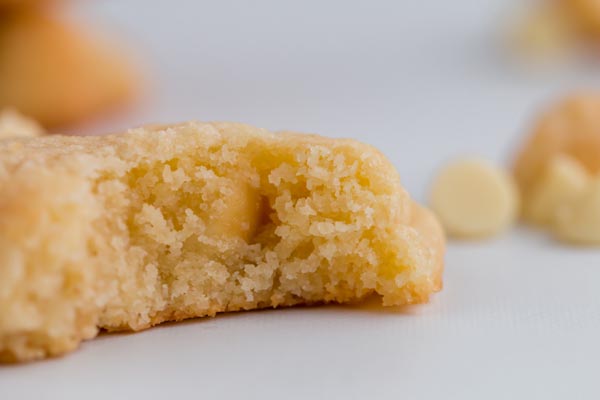 a bite out of a thick keto cookie