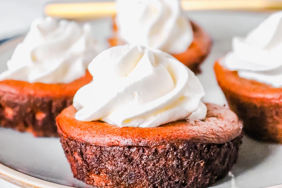 little crustless pumpkin pie topped with whipped cream