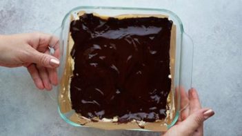 dark chocolate layer on a baking dish