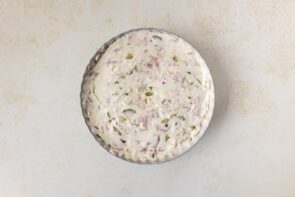 Chopped ham, dill pickles, and seasonings mixed into the creamy base to make pickle wrap dip.