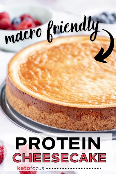 A full protein cheesecake with crust on a plate.