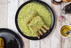 coating a rack of lamb with herb mixture