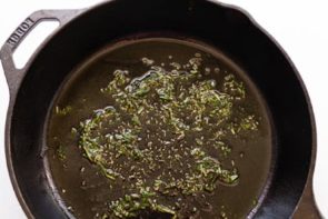 rosemary and garlic in a skillet