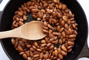 almonds toasting in a skillet