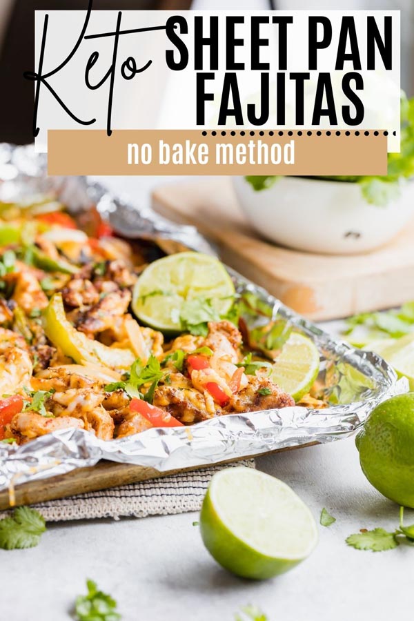 a vibrant fajita mixture on a sheet pan topped with limes